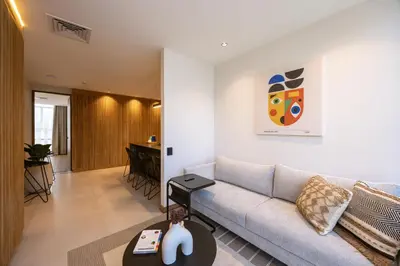 a living room with a couch and a table at Bio 26 Apartments in Medellín