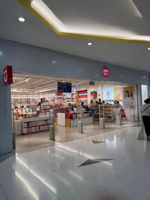 a shopping mall with people in a store at Apto 203 - Casa bendita in Medellín