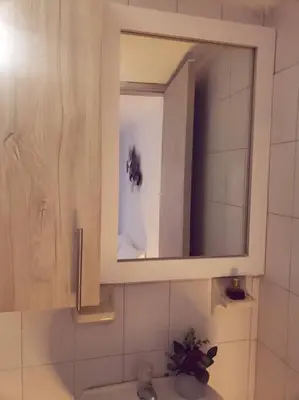 a bathroom with a sink and a medicine cabinet at Divino Apartamento Moderno con la Mejor Ubicación in Manizales
