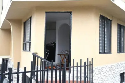 a front door of a house with a fence at Divino Apartamento Moderno con la Mejor Ubicación in Manizales