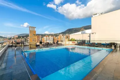 a large swimming pool on top of a building at Amazing apartment in el Poblado in Medellín
