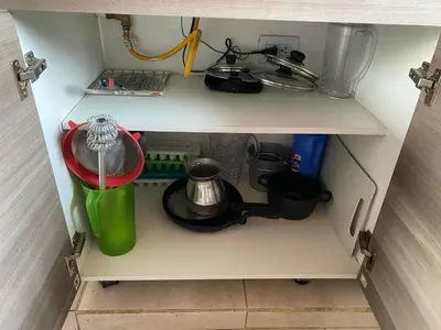 a shelf with some pots and pans on it at Hermoso Aparta-Estudio En Envigado cerca de Medellin in Envigado