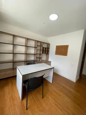 an empty room with a desk and a chair at Apartamento Montreal in Medellín