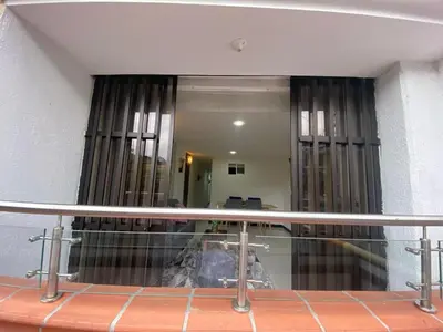 a view of a living room from a balcony at Apartamento Cozy in Medellín
