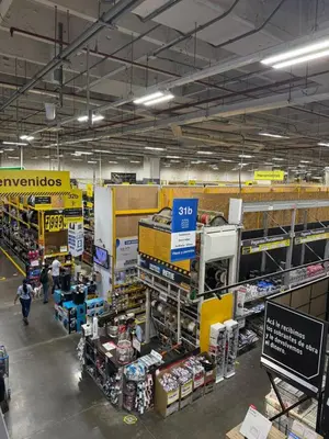a grocery store aisle with people shopping in a store at Aparta estudio 205- Casa Bendita in Medellín