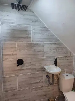a bathroom with a sink and a toilet at Espectacular Aparta estudio Laureles in Medellín
