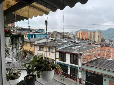 a view of a city from a balcony at Apartamento Barrio la Argentina vía principal 302 in Manizales
