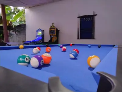 a room with a pool table with balls on it at Hotel campestre París soleil in Mariquita