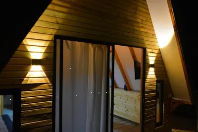 a bathroom with a shower and a mirror in a room at Cabaña Madre Selva in San Vicente