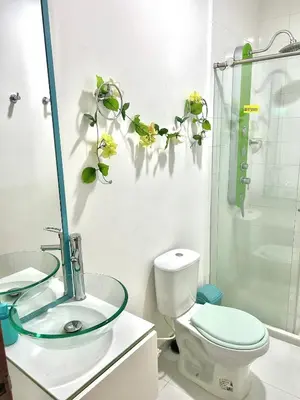 a bathroom with a sink and a toilet and a shower at Apartamento Vacacional San Jerónimo in Medellín
