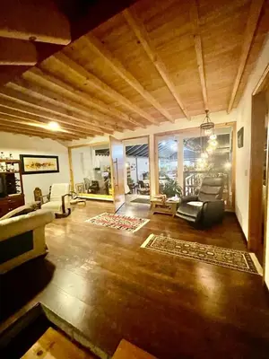 a large living room with a couch and chairs at ATHOS hotel boutique B&B in Pensilvania