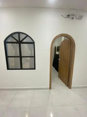a room with a door and a mirror on a wall at Habitaciones en Doradal 203 in Doradal