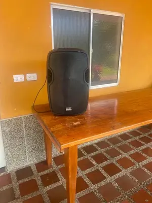 a television sitting on top of a wooden table at Finca Villa Cristian Copacabana Antioquia in Copacabana
