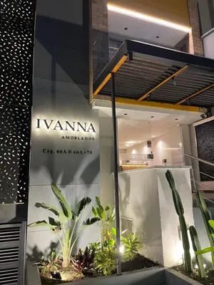 a display of plants in a store window at Ivanna Jumar ApartaHotel - Laureles Estadio in Medellín