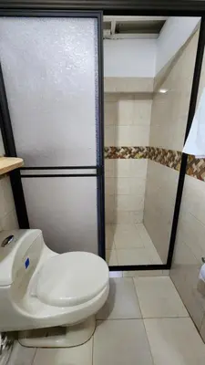 a bathroom with a toilet and a shower at Finca Carrizales in Jardin
