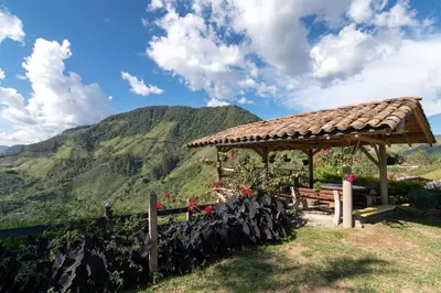 a gazebo with a view of a mountain at Finca Carrizales in Jardin