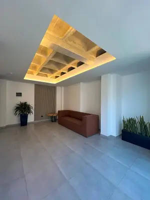 a living room with a couch under a ceiling at c202 - Loft, hab1, baño 1, 1tv, sofacama, wifi in La Ceja