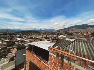 a view of a city from the roof of a building at Vacacional, Casa ideal cerca a zona turística in Medellín