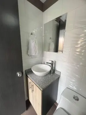 a bathroom with a sink and a toilet at Lindo apartamento poblado 111 in Medellín