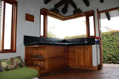 a bathroom with a sink and a window at Casa finca pietrasanta in Rionegro