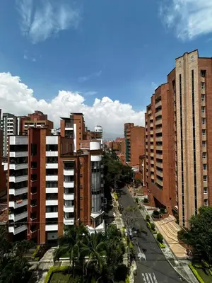 an aerial view of a city with tall buildings at Bright and Modern Medellin Apartment in Medellín