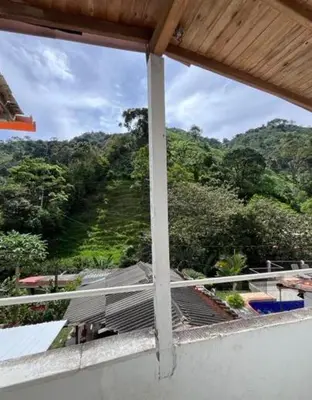 a view of a mountain from a balcony at Villa Arte Rustico in Ciudad Bolívar
