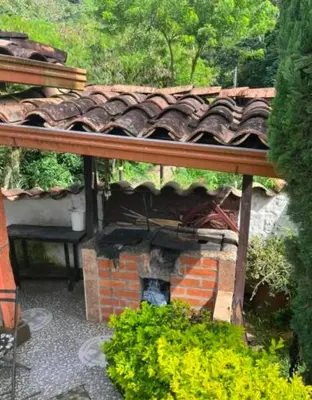 an overhead view of a house with a brick fireplace at Villa Arte Rustico in Ciudad Bolívar