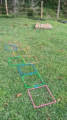 a group of nets on the grass in a yard at Camping tipo eco-confort Refugio Lancaster in Urrao