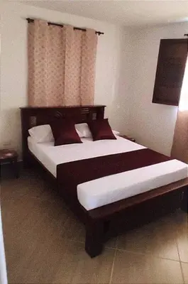 a bedroom with two beds and a window at Polandia in Villa Silvia