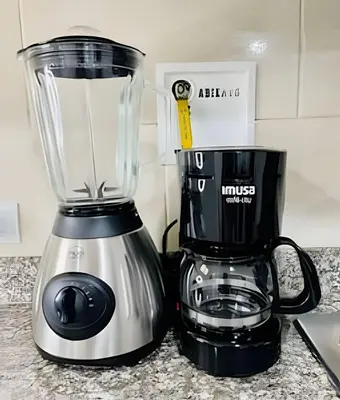 a blender sitting on a counter next to a coffee maker at 9902Aparta estudio totalmente dotado WiFi200 megas in Envigado