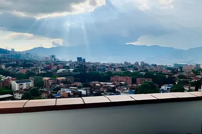a view of a city from the top of a building at beautiful view of the city with local experience in Envigado