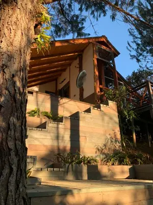 a house with stairs leading up to it at PrivaDune in Rionegro