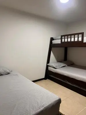 a room with two bunk beds in a room at Ciudadela Santa Fe in Santa Fe de Antioquia