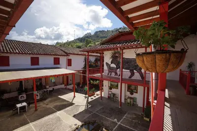 an overhead view of a building with a courtyard at La Oculta Hostal in Jericó