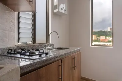 a kitchen with a sink and a counter top at Apartamento en el Cable mejor zona en Manizales in Manizales