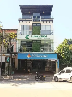 a motorcycle parked in front of a building at Hotel Luna Verde in Doradal