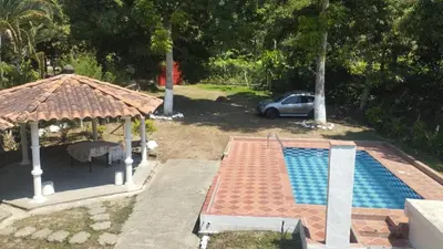 an overhead view of a swimming pool with a gazebo at Finca Villa Dudia in Sopetran