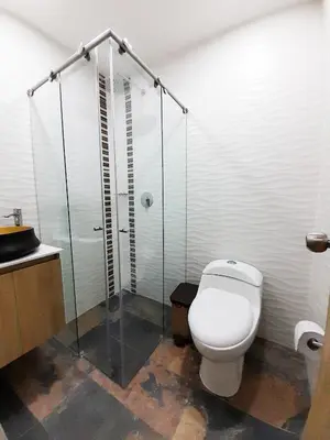 a bathroom with a toilet and a shower at Medellin cómodo apartaestudio 503 in Medellín
