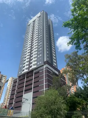 a tall building with a blue sky in the background at Piso27 PROMO! LUJOSO APARTAMENTO, PARKING Y ZONAS HUMEDAS in Sabaneta