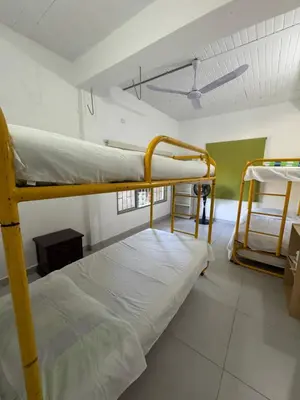 two bunk beds in a room with a ceiling at Acogedora cabaña en la Pintada in La Pintada