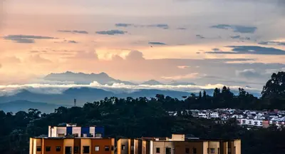 a view of a city with clouds in the sky at Maravillosas vistas, excelente ubicación in Manizales