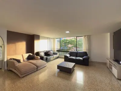 a living room with two couches and a tv at 5BR 232 m² apartment in El Poblado, El Tesoro in Medellín