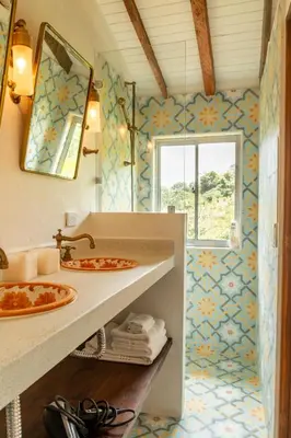 a bathroom with a sink and a mirror at Organic Finca with Modern Amenities in Jericó