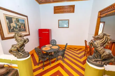 a dining room with a table and chairs at Casa Hotel Santa Laura Jericó in Jericó