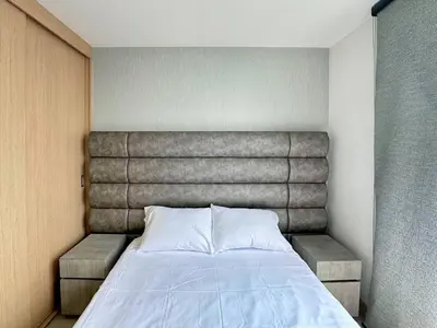 a bedroom with a bed with a head board at 3BR Panoramic Near Country Club El Poblado in Medellín