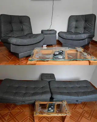 a living room with two couches and a table at Apto Acogedor Cerca Metrocable in Medellín