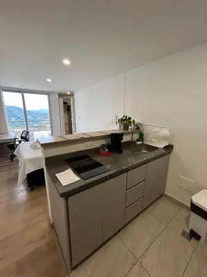 a kitchen with a sink and a counter top at Sofisticado con Ubicación privilegiada - Estrato 5 in Manizales