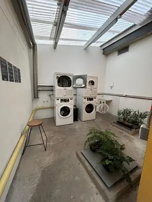 two washing machines are sitting in a room at Sofisticado con Ubicación privilegiada - Estrato 5 in Manizales