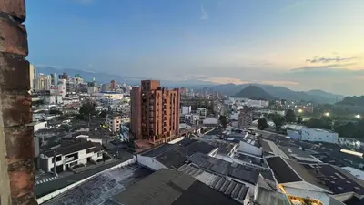 a view of a city with buildings and mountains at Apartamento 3 habitaciones 2 baños Vista Panoramica - Av Santander Sector El Cable y Estadio Palogrande in Manizales