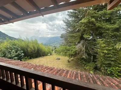 a view of a yard from a balcony at Paraiso del Nomada in Barbosa